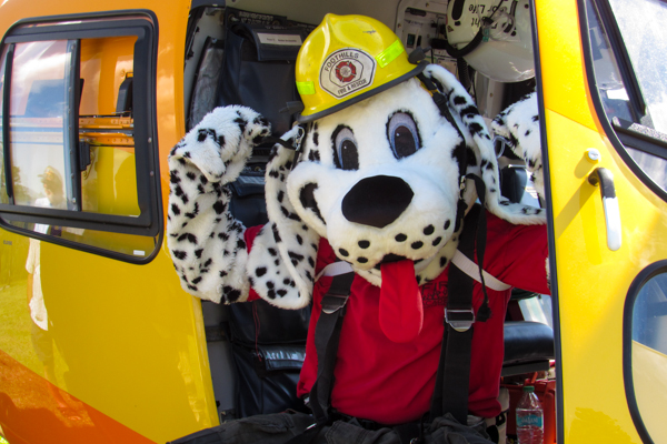 Sparky Flexing at the Pancake Breakfast