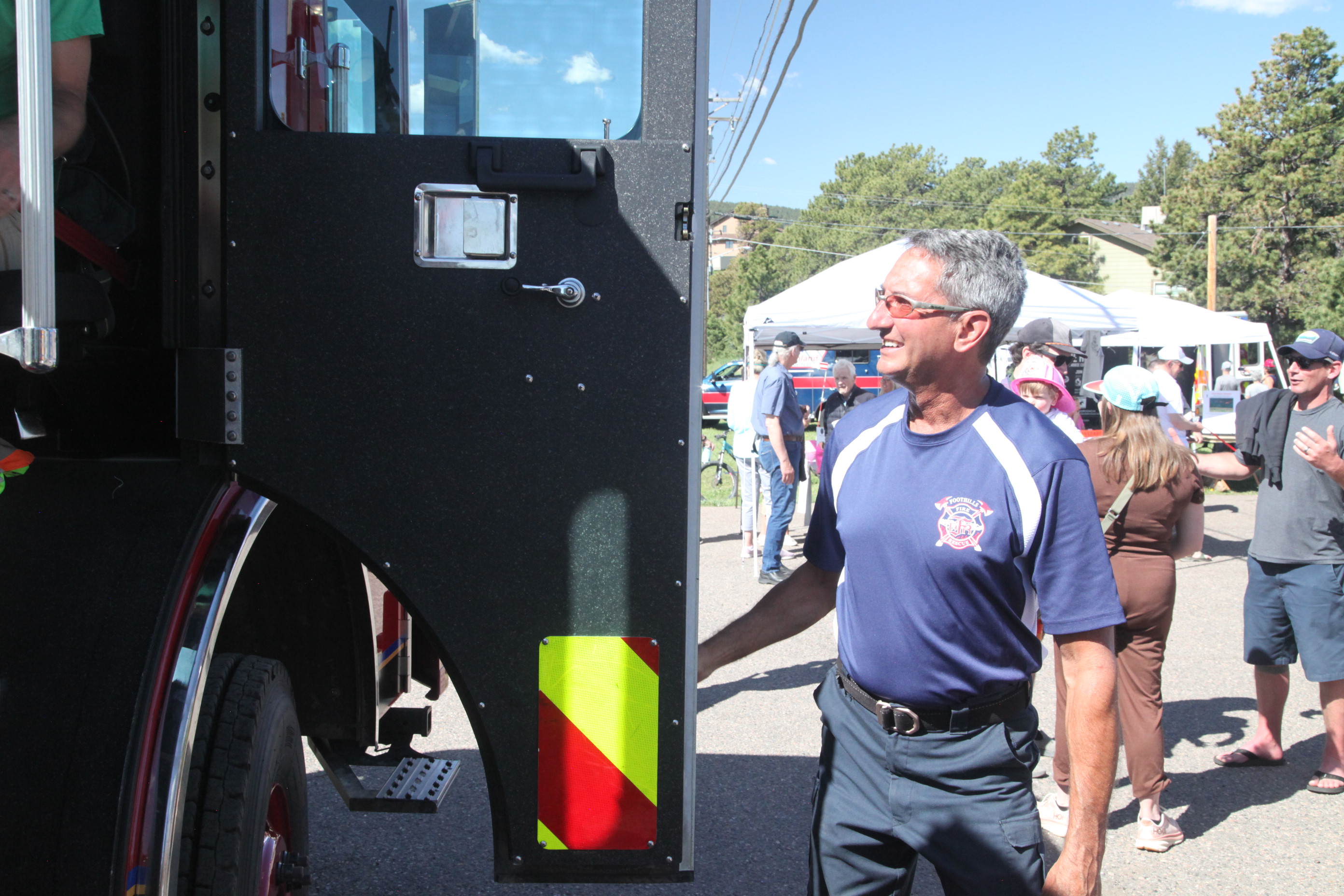 Firefighter Showing Off Fire Truck